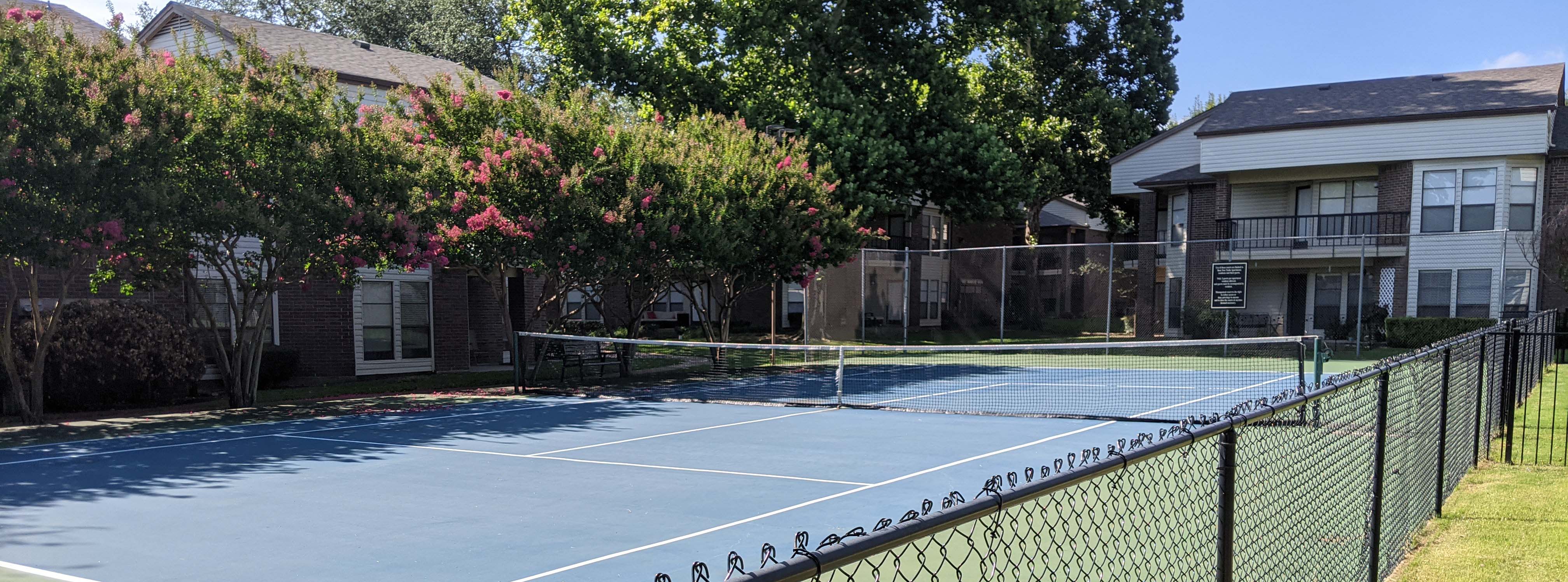 Apartments with tennis courts.